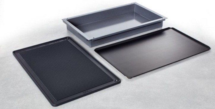 Three RATIONAL cooking trays displayed: one deep tray, one flat tray, and one ribbed tray.