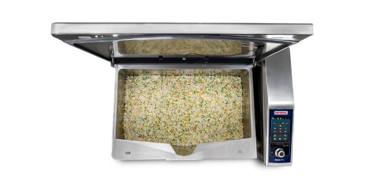 Top view of RATIONAL iVario Pro filled with cooked rice and vegetables.