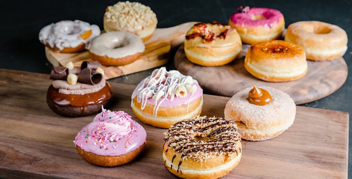 A tray of freshly baked pastries that are a nice golden colour with lots of crispy layers, perfectly baked.