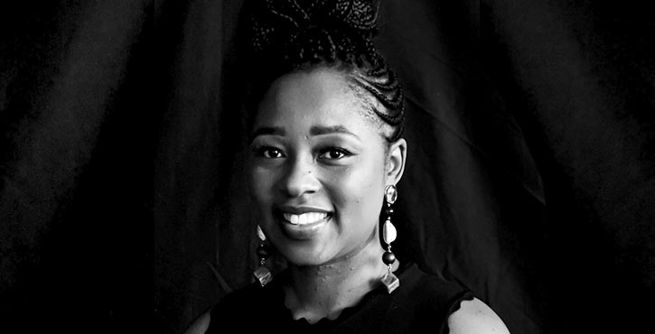 Portrait of a smiling woman, black and white.