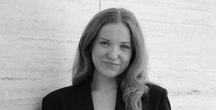 Black and white portrait of Michelle Viola Kilmey with a slight smile.