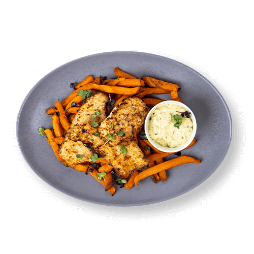 Plate of breaded fish fillets served with sweet potato fries and a small bowl of sauce.