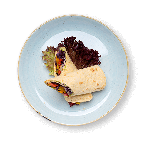 Plate with vegetable wraps served on a bed of lettuce.