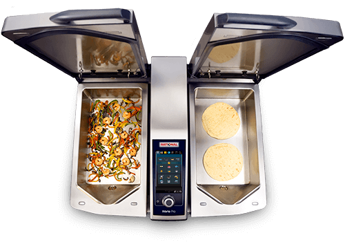 Top view of an iVario Pro 2-S with one compartment holding sautéed shrimp and peppers, and another with tortillas.