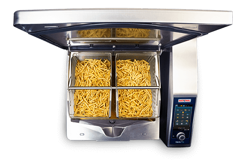 The Rational iVarioPro L with an open lid, displaying two baskets filled with golden fries.