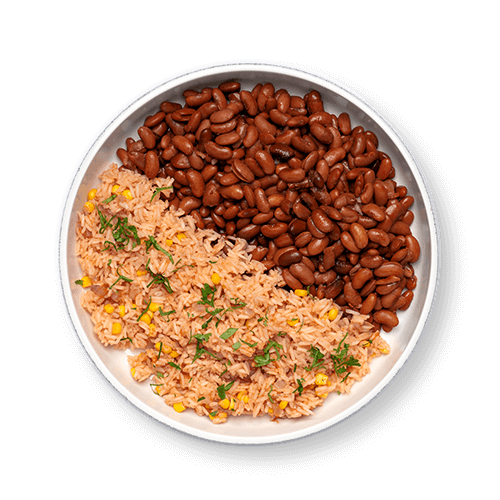 Plate with a serving of rice mixed with corn and a side of brown beans.