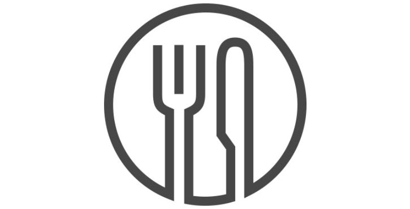 A simple icon featuring a fork and knife crossed over each other, enclosed in a circular design, representing casual dining.