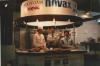 A photo of a Rational booth at a trade show in Tokyo featuring chefs cooking at a display with various dishes and a banner.