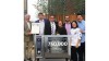 Group photo celebrating the sale of the 750,000th Rational unit, featuring the new owner and Rational representatives.