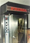Close-up of a Rational CM 201 oven with the name ‘FRIMA‘ displayed above it, showcasing its control panel and stainless steel design.