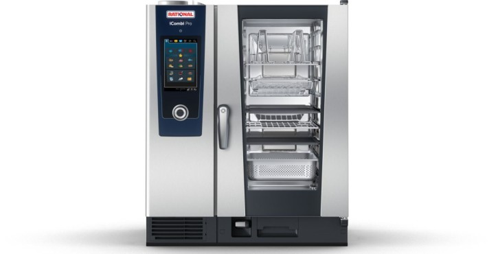 RATIONAL iCombi Pro oven displayed with various cooking accessories in the cooking chamber.