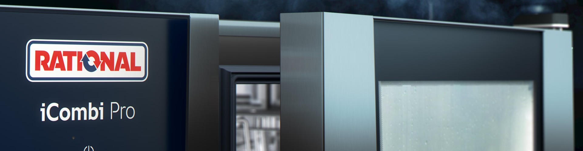 A close-up view of the Rational iCombi Pro oven, highlighting the logo and control panel, with steam visible in the background.