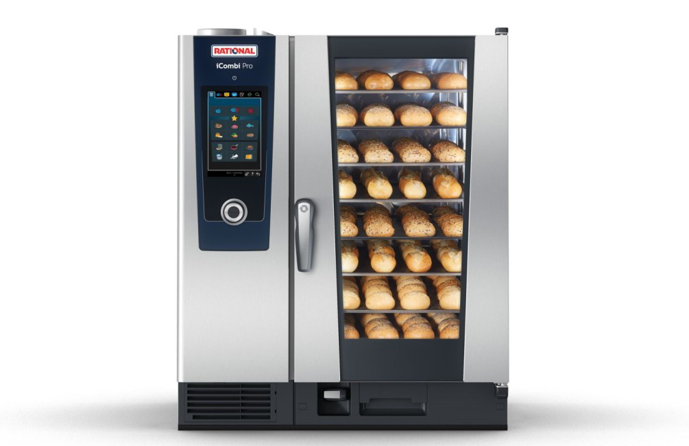 A front view of an iCombi Pro oven filled with various baked bread rolls, showcasing its baking capabilities.
