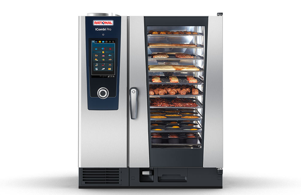 A Rational iCombi Pro oven with a digital display, showcasing a variety of food items on multiple trays inside.