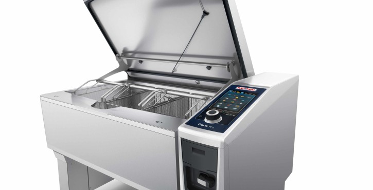 A side view of the Rational iVario Pro cooking appliance with the lid open, showcasing its stainless steel interior and control panel.