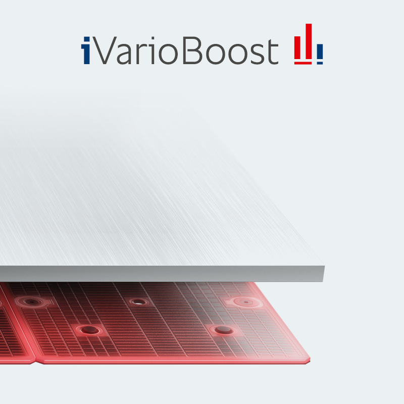 iVarioBoost heating system with glowing heat beneath stainless steel cooking surface.