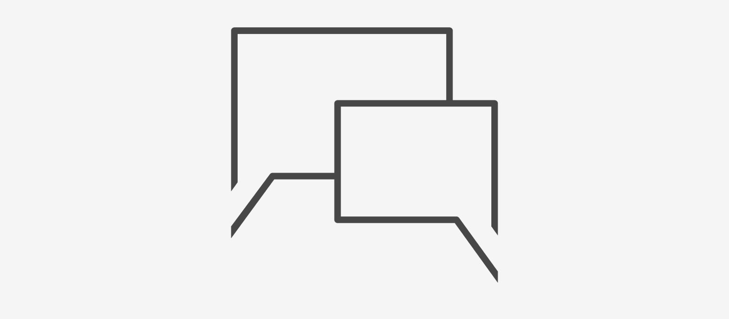 Icon of two overlapping speech bubbles representing communication or dialogue.